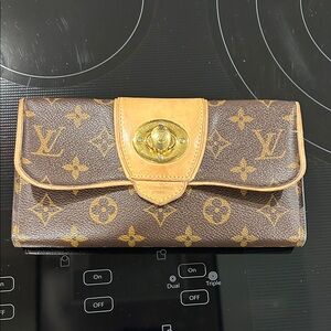 Louis Vuitton Brown and Tan Clutch with Gold Accents
